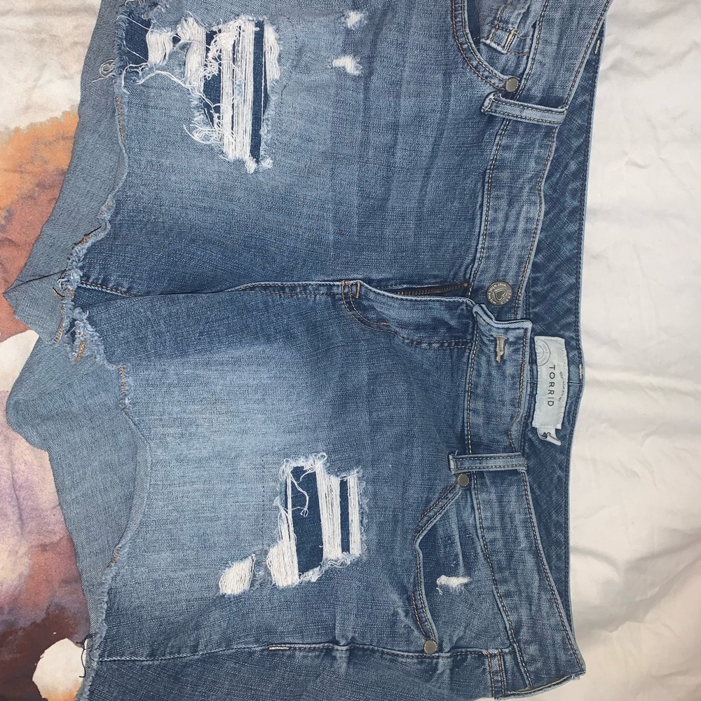 Torrid ripped jean shorts